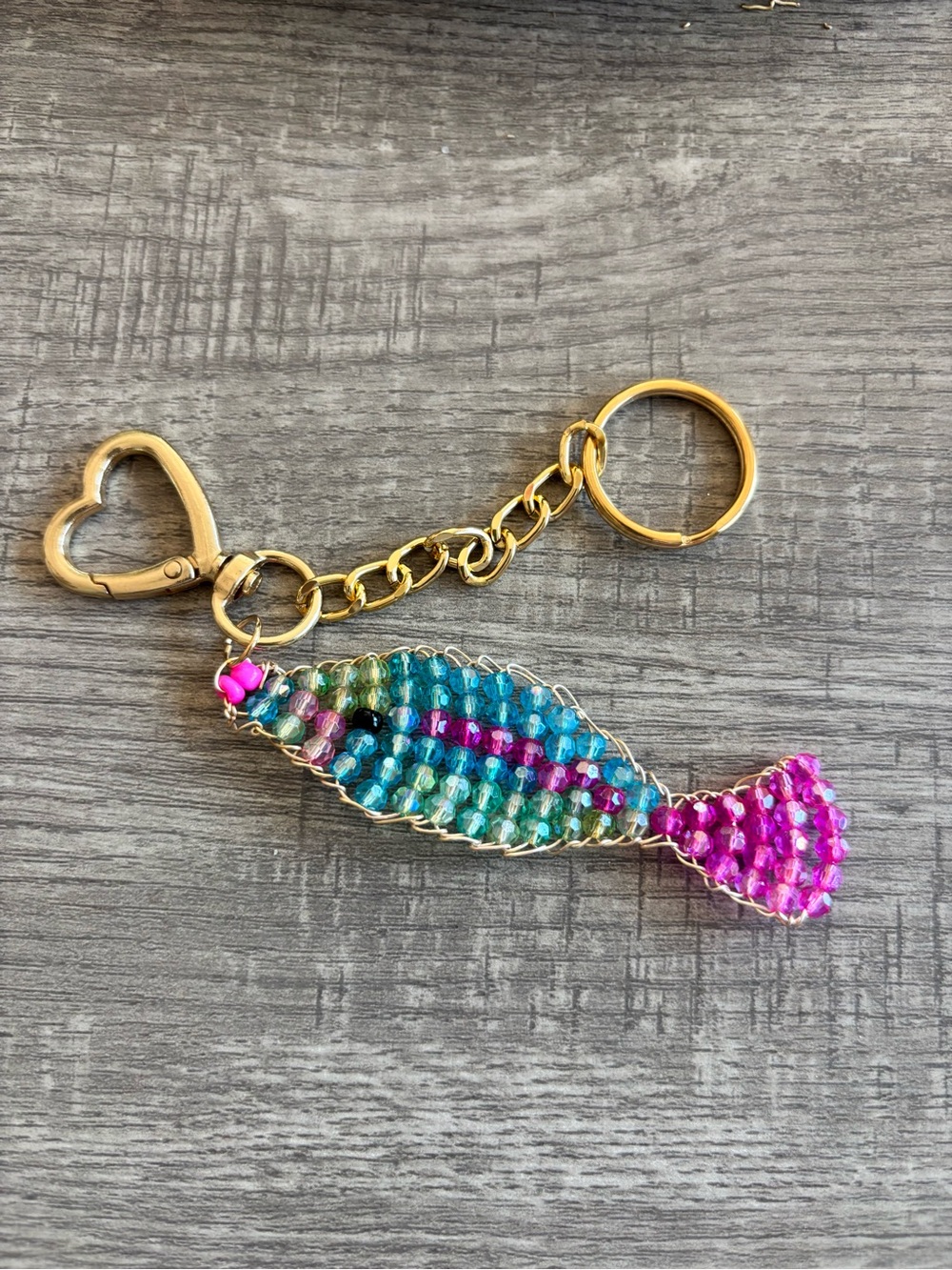 Sparkly multicolor fish bag charm